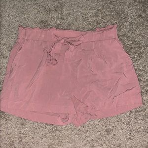 Super cute pink drawstring shorts.